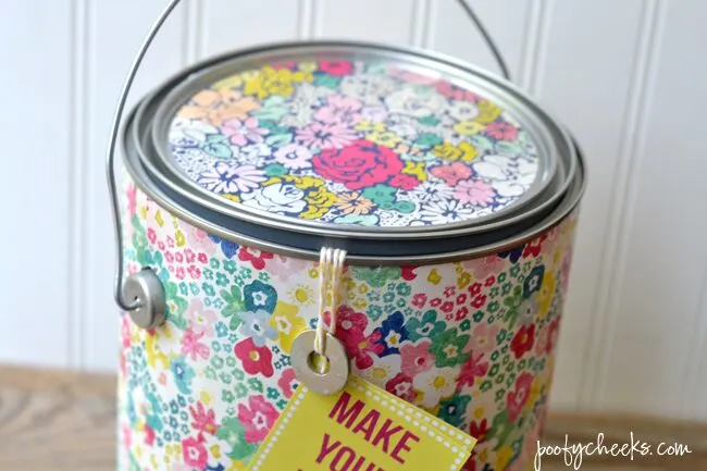 Need a fun housewarming gift idea? Stuff a paint can with paint supplies and tie on this free printable tag.