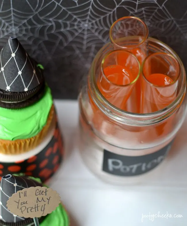 Create spooky Halloween cupcakes with a boxed cake mix and Fanta. Oreo Witch Hats add to the spookiness of these fun cupcakes!