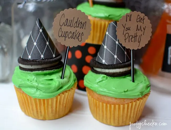 Create spooky Halloween cupcakes with a boxed cake mix and Fanta. Oreo Witch Hats add to the spookiness of these fun cupcakes!