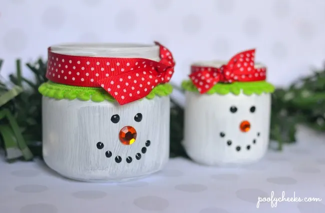 DIY Repurposed Glass Jar Luminaries - Turn glass jars into these cute snowmen!