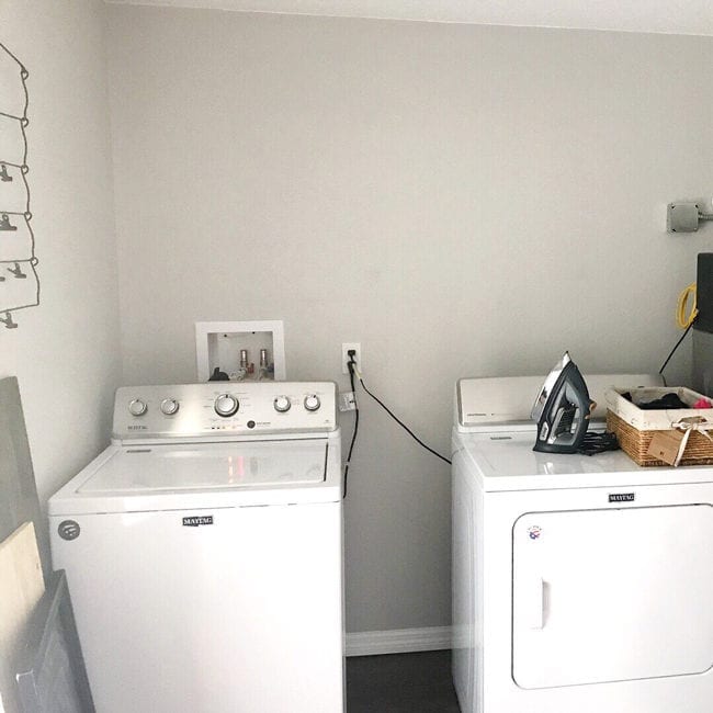 Laundry Room Storage Solutions - Add cabinets and shelving above washer and dryer for storage and organization.