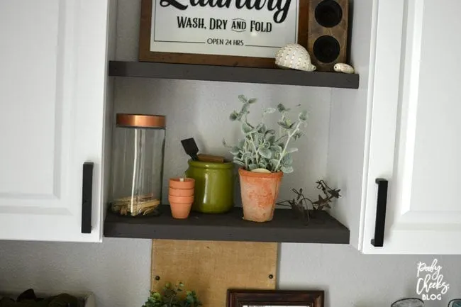 Laundry room before and after - an ugly boring laundry room transformed into a farmhouse laundry room.