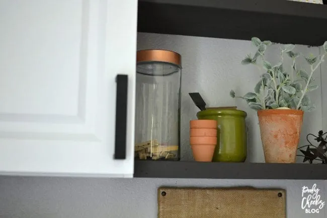 Laundry room before and after - an ugly boring laundry room transformed into a farmhouse laundry room.