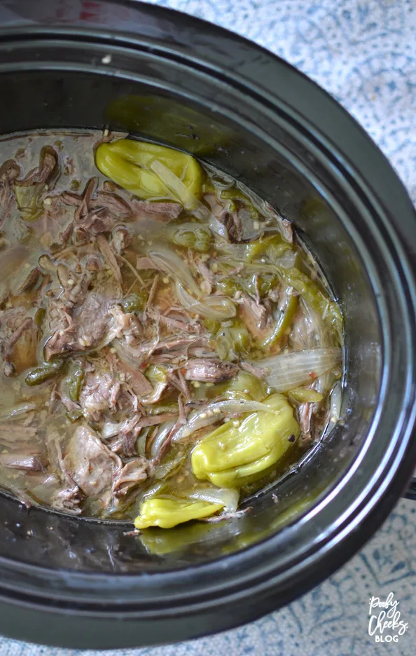 Crock pot italian beef recipe - a slow cooker recipe for Italian Beef sandwiches. The smell fills the house and it absolutely mouthwatering.