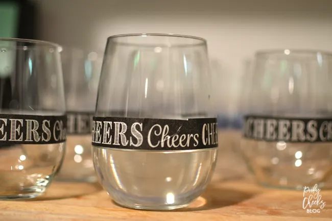 DIY Dishwasher Safe Glitter Glasses Tutorial. Step by step pictures - personalized with adhesive vinyl using a Silhouette or Cameo cutting machine.