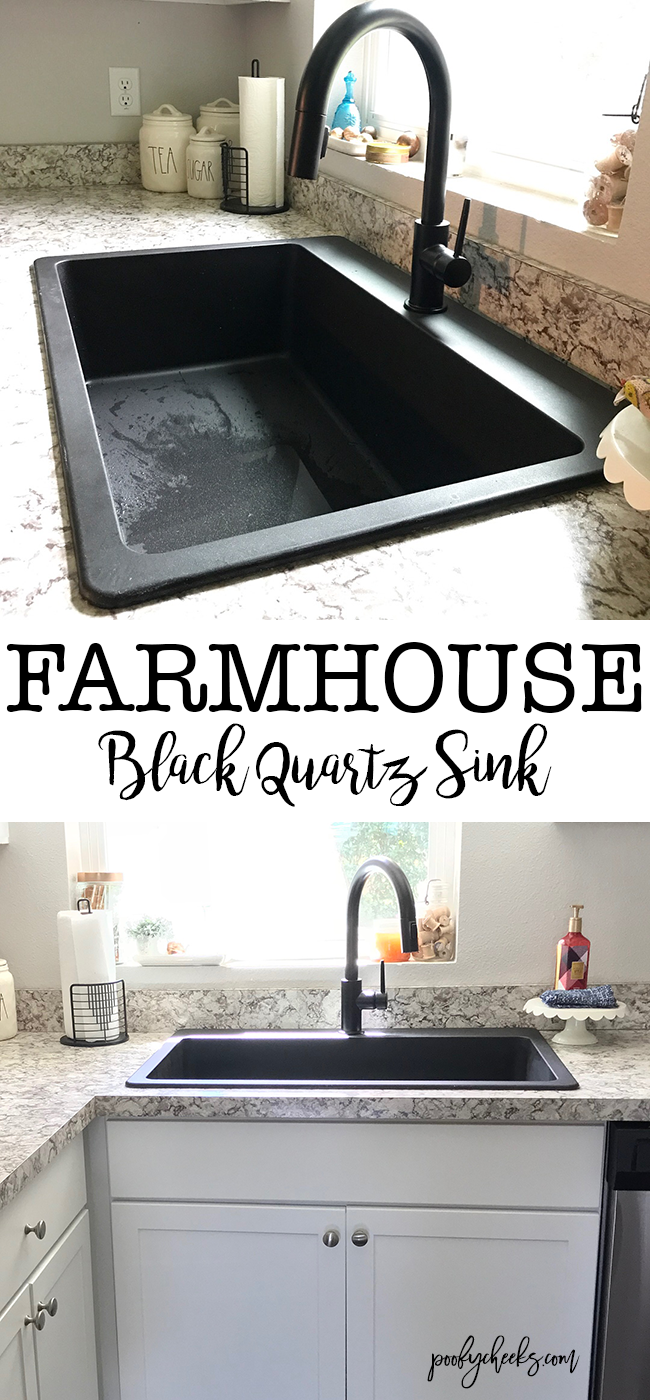 Black quartz farmhouse sink with black faucet. 