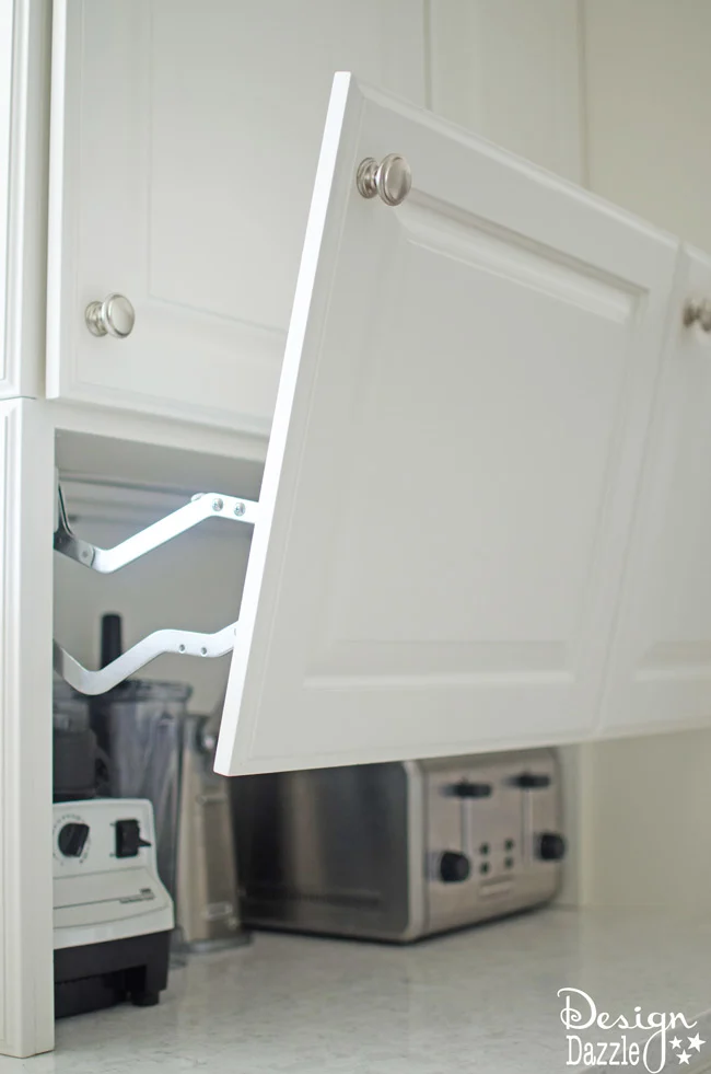 Hidden cabinets for small kitchen appliances.